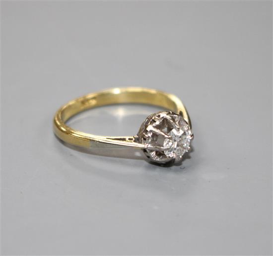 An 18ct and illusion set solitaire diamond ring,